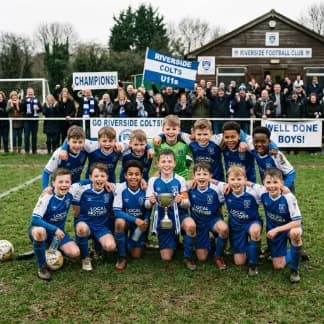 A junior sports team lined up together for a squad photo